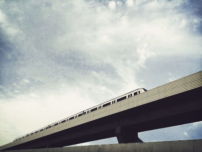 Low angle view of train against sky