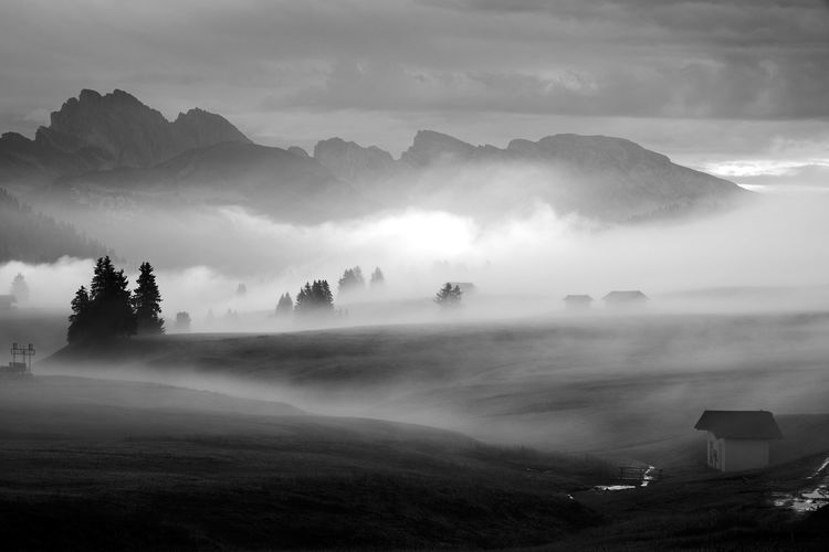 Scenic view of fog over landscape