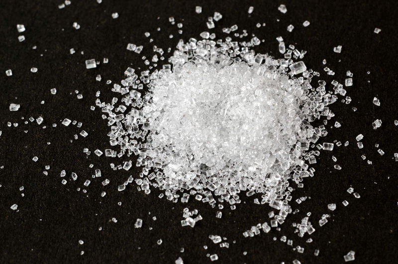 Close-up of sugar on table