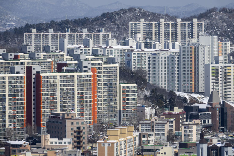 High angle view of modern buildings in city