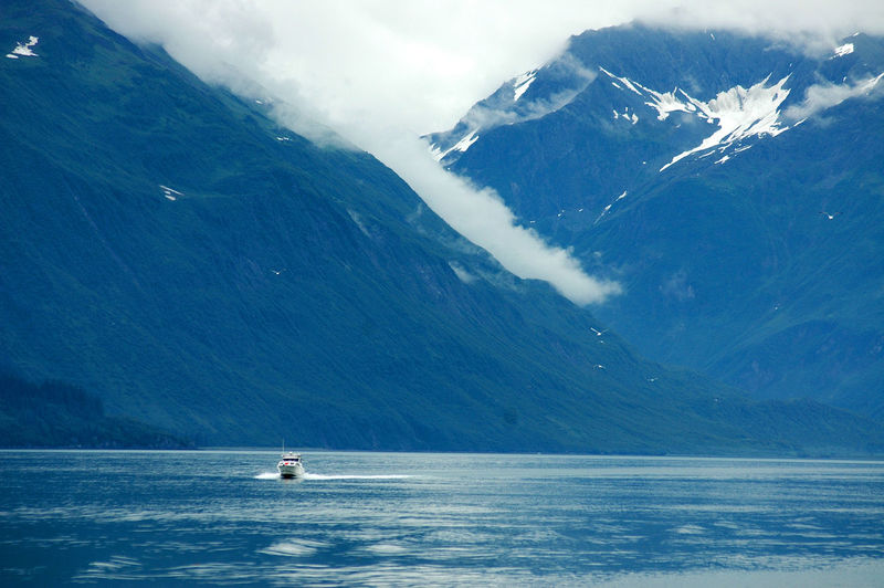 Boating the cold blue waters off alaskan coast