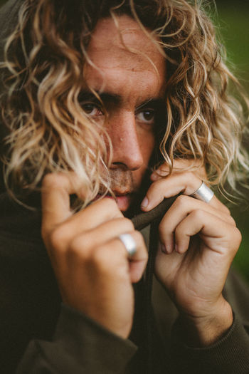 Close-up of thoughtful man with blond hair