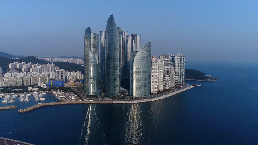 Modern buildings in city at waterfront