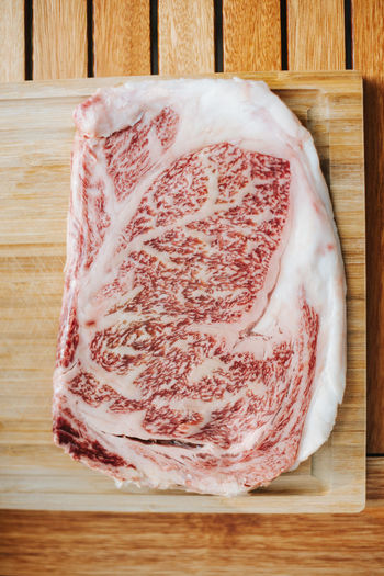 Raw wagyu kobe steak on a cutting board