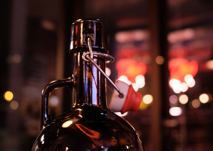 Close-up of beer bottle in bar