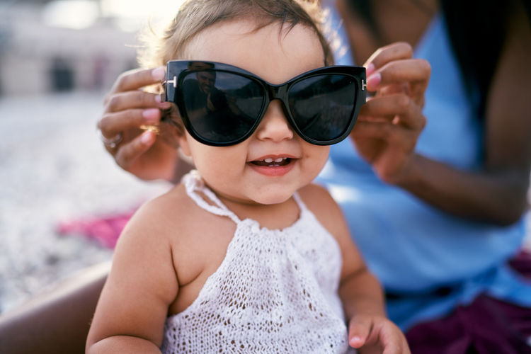 Portrait of cute boy wearing sunglasses