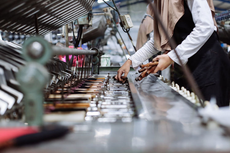 Midsection of woman working