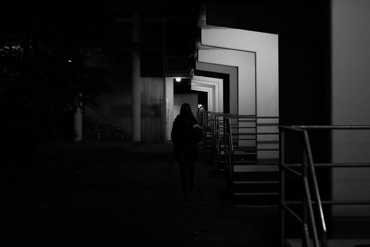 Silhouette of woman in building