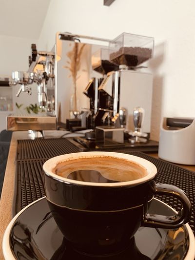 Close-up of coffee cup on table