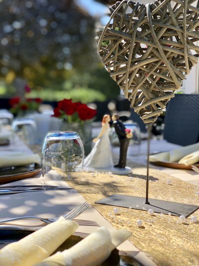 Close-up of decorated table during wedding ceremony