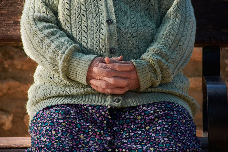 Close-up of a hands of an older woman. grandmother hands
