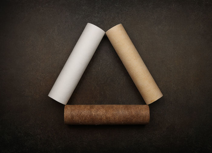 High angle view of cigarette against white background