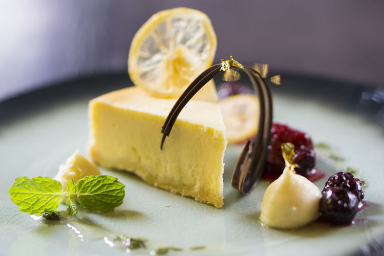 Close-up of cheese cake in plate on table
