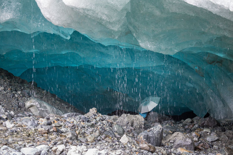 Person visiting ice cave 