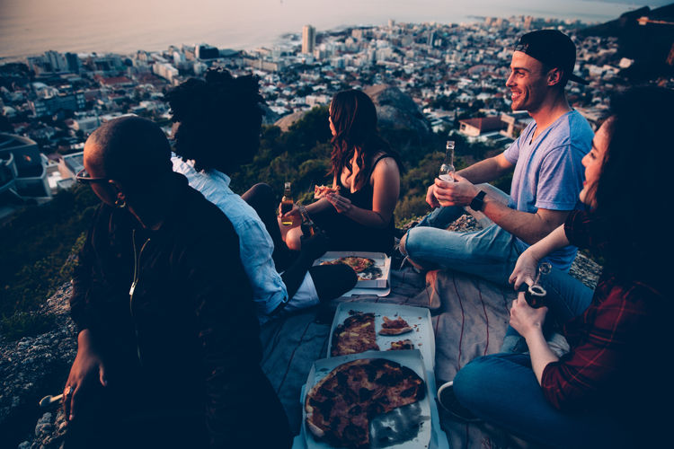People having picnic at sunset