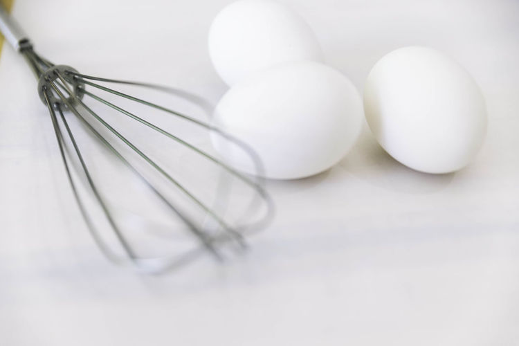 High angle view of eggs on white table