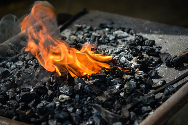 Close-up of bonfire on barbecue