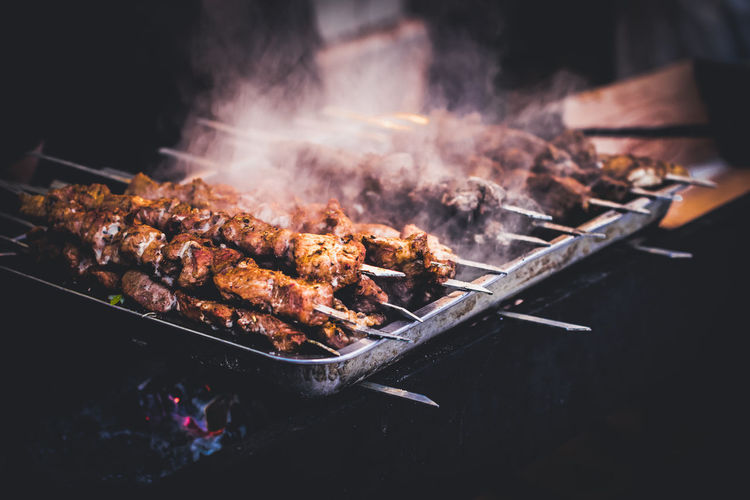 Close-up of meat on grill