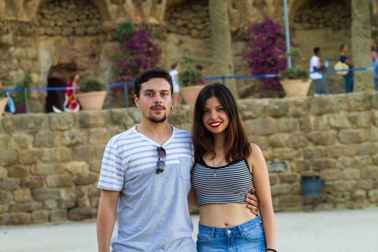 Portrait of couple standing at park guell