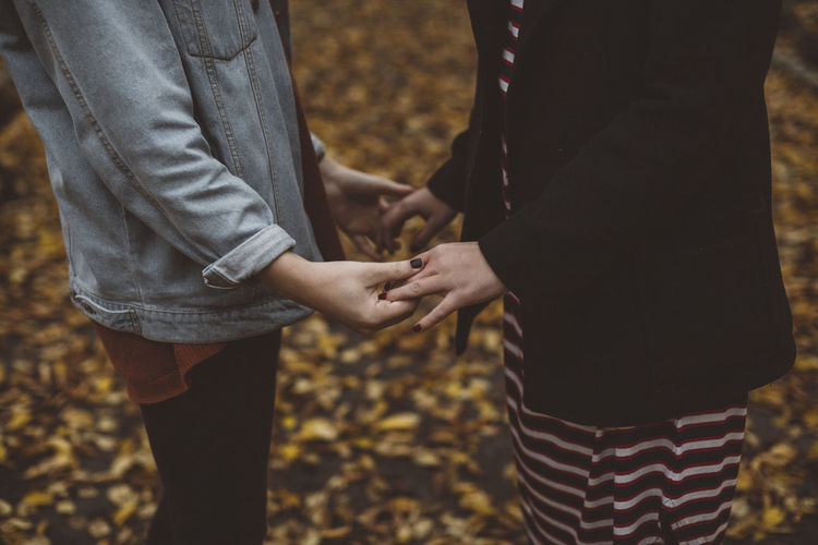 Women holding hands