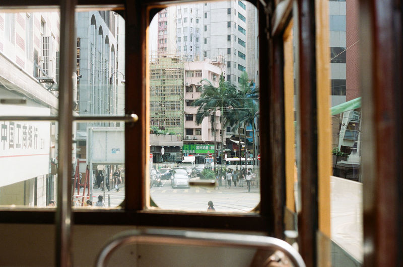 Buildings seen through train window